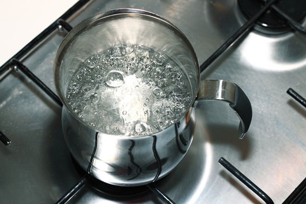 kokande vatten för beredning av medicinsk dryck