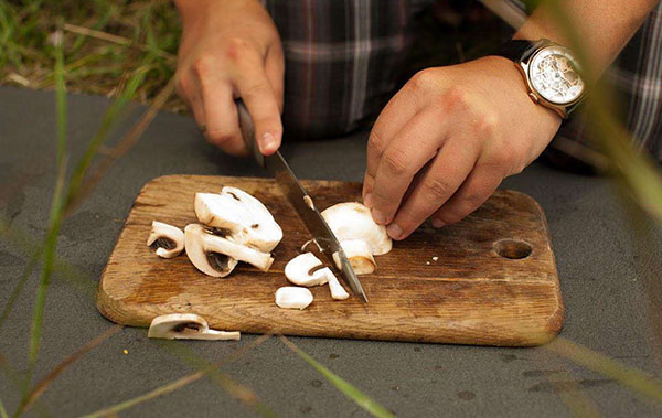 snij de champignons in platen