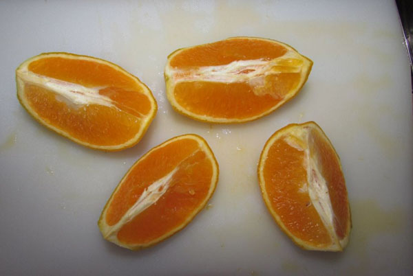 kutte en oransje i 4 stk