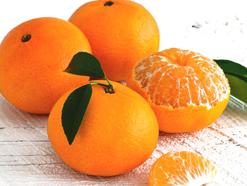Oranje fruit is geliefd bij zowel volwassenen als kinderen